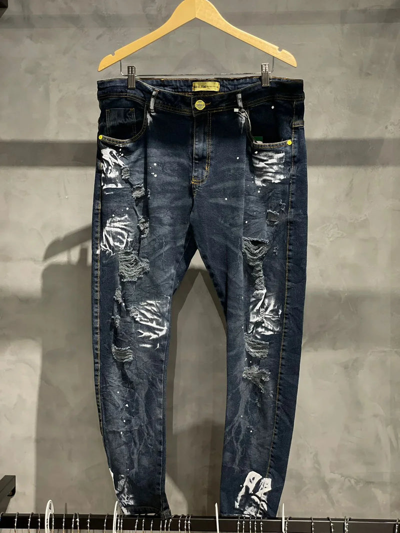 CALÇA JEANS ESCURA MODELO JOGADOR COM FORRO E RESOINGOS